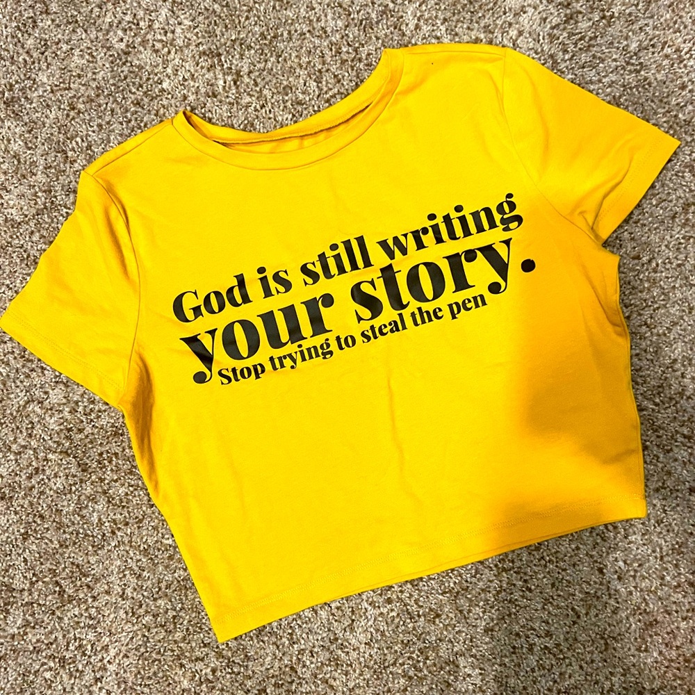 God is still writing your story mustard color crop